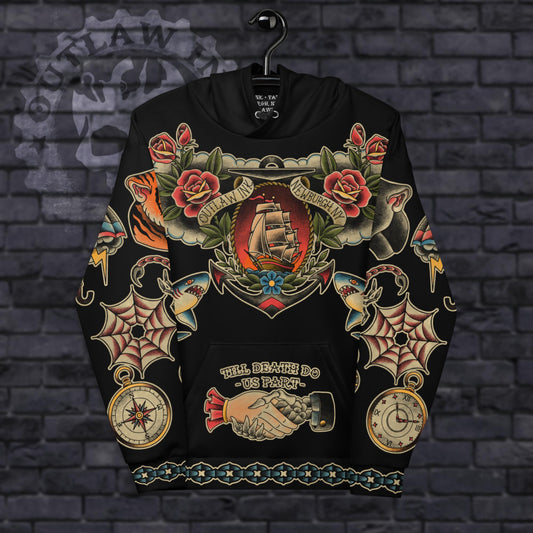 A black hoodie covered in vibrant American Traditional tattoo designs, including a clipper ship at sunset on the front, bold sleeve artwork with panther and tiger motifs, and a playful text design on the back stating, "I have really cool tattoos under here, but I'm cold." Details include intricate roses, swallows, daggers, and chains, all rendered in a bold, colorful palette with a watercolor texture.